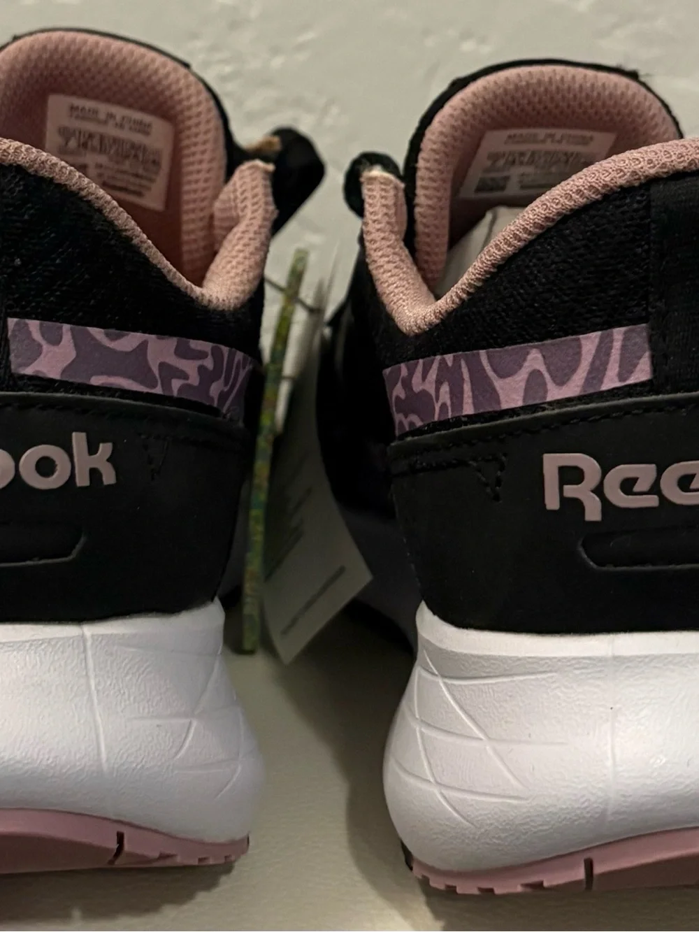 Reebok Black Shoe with Lilac Collar and Orange Insole